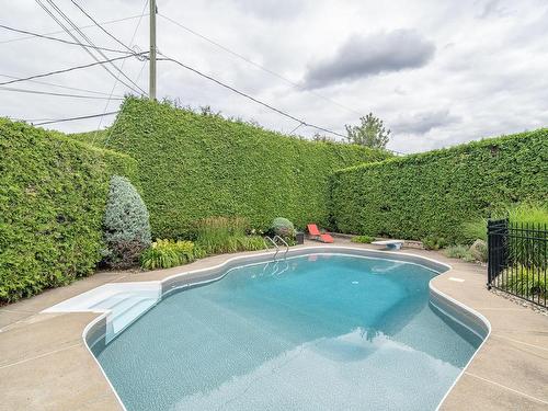 Piscine - 1525 Rue Dorion, Laval (Duvernay), QC - Outdoor With In Ground Pool With Backyard