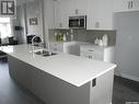 1071 Brighton Gate, Saskatoon, SK  - Indoor Photo Showing Kitchen With Double Sink With Upgraded Kitchen 