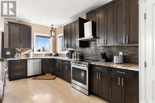 15 Emerald Hill Drive, White City, SK - Indoor Photo Showing Kitchen With Upgraded Kitchen