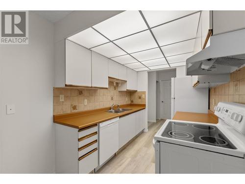 1056 Bernard Avenue Unit# 205, Kelowna, BC - Indoor Photo Showing Kitchen With Double Sink