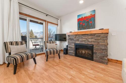 222 - 701 14A Crescent, Invermere, BC - Indoor Photo Showing Living Room With Fireplace