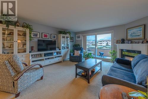 8700 Jubilee Road E Unit# 204, Summerland, BC - Indoor Photo Showing Living Room With Fireplace