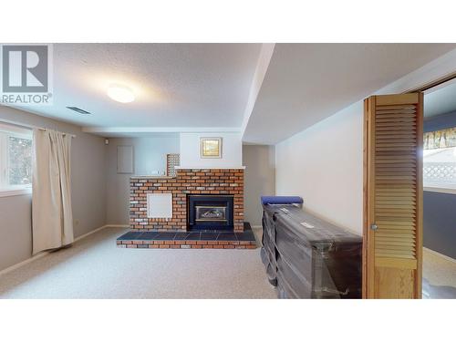 1757 Cypress Road, Quesnel, BC - Indoor With Fireplace