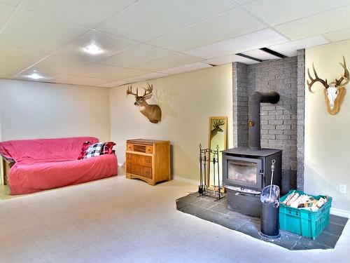 Salle familiale - 1930 Ch. Godin, Sherbrooke (Brompton/Rock Forest/Saint-Élie/Deauville), QC - Indoor Photo Showing Other Room With Fireplace