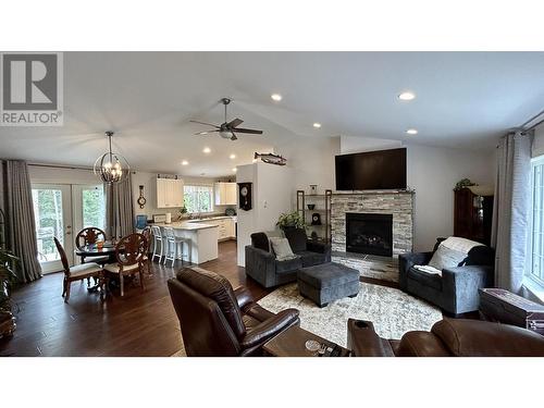 5007 Kyllo Road, 108 Mile Ranch, BC - Indoor Photo Showing Living Room With Fireplace