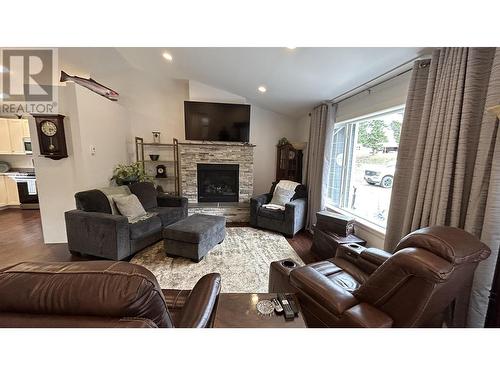 5007 Kyllo Road, 108 Mile Ranch, BC - Indoor Photo Showing Living Room With Fireplace