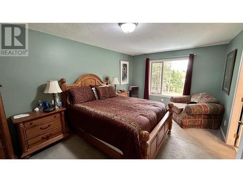 4906 Kitwanga Drive, 108 Mile Ranch, BC - Indoor Photo Showing Bedroom