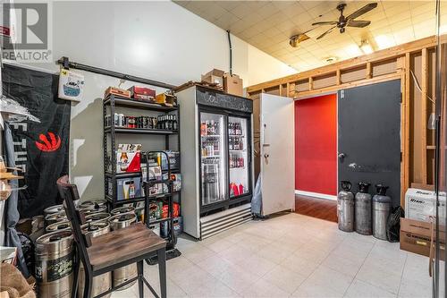 A 12 foot by 13'8" neat and tidy storage room leads to the kitchen. Ask listing agent for a list of inclusions in the storage room. - 23 Thorold Lane, Ingleside, ON 