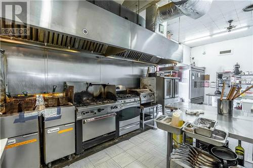 The kitchen is equipped with ventilation equipment. - 23 Thorold Lane, Ingleside, ON 