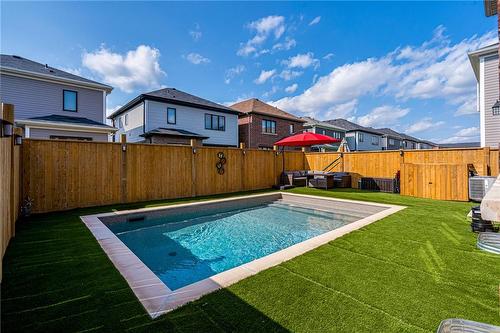 11 Malcolm Crescent, Caledonia, ON - Outdoor With In Ground Pool With Backyard