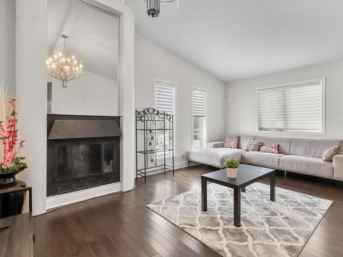 Salle familiale - 1025 38E Avenue, Laval (Fabreville), QC - Indoor Photo Showing Living Room With Fireplace