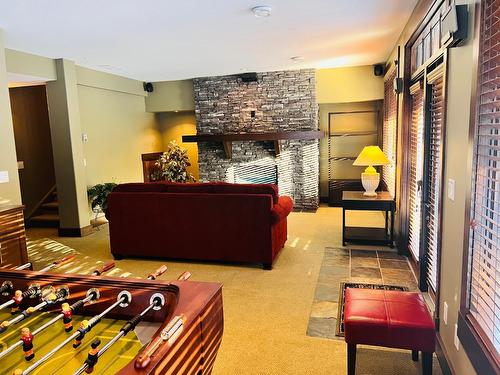 2 - 2600 Riverrock Way, Invermere, BC - Indoor With Fireplace
