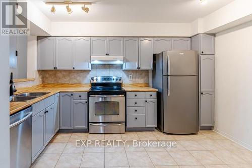 83 Green Briar Rd, New Tecumseth, ON - Indoor Photo Showing Kitchen With Double Sink