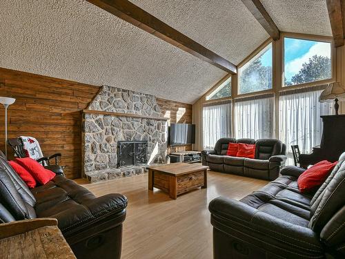 Salon - 10 Rue Ekers, Sainte-Agathe-Des-Monts, QC - Indoor Photo Showing Living Room With Fireplace