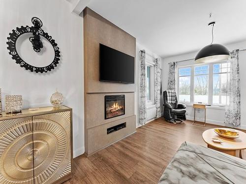 Living room - 111 Rue St-Thomas, Notre-Dame-Du-Bon-Conseil - Village, QC - Indoor Photo Showing Living Room With Fireplace