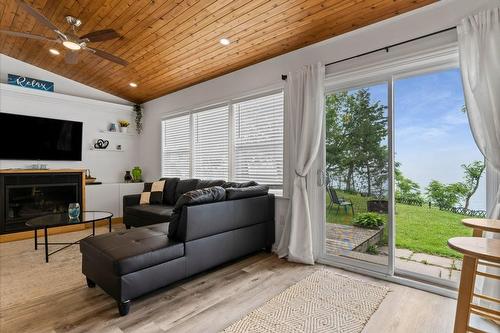 25 Erie Heights Line, Lowbanks, ON - Indoor Photo Showing Living Room With Fireplace