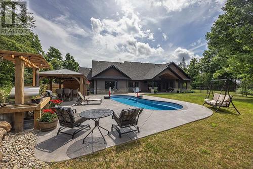 1080 Applewood Lane, South Frontenac, ON - Outdoor With In Ground Pool With Backyard
