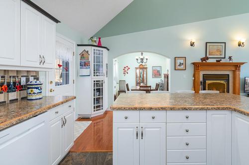 304 Dugan Street, Creston, BC - Indoor Photo Showing Kitchen With Fireplace
