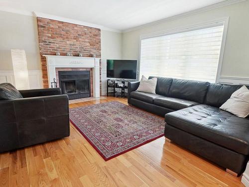 Salon - 773 Rue Des Huards, Mont-Saint-Hilaire, QC - Indoor Photo Showing Living Room With Fireplace