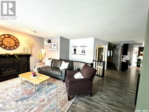 504 Highland Drive, Swift Current, SK - Indoor Photo Showing Living Room With Fireplace