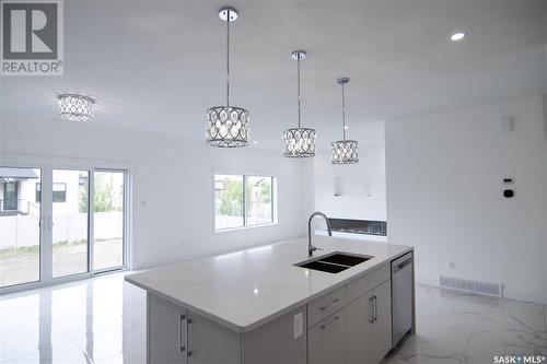 4406 Wolf Willow Place, Regina, SK - Indoor Photo Showing Kitchen With Double Sink