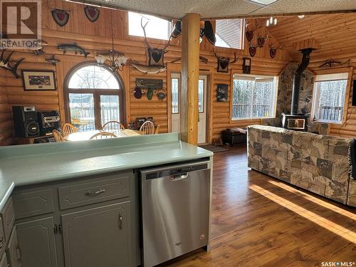 3702 Walker Street, Missinipe, SK - Indoor Photo Showing Living Room With Fireplace