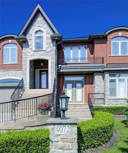 Rate separate service grade entrances - 4072 Highland Park Drive, Beamsville, ON - Outdoor With Balcony With Facade