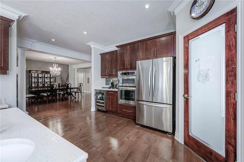 Caesarstone counters and stainless appliances - 4072 Highland Park Drive, Beamsville, ON - Indoor Photo Showing Kitchen