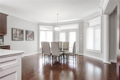 Lots of natural light from the nearly floor to ceiling windows and garden  doors - 4072 Highland Park Drive, Beamsville, ON - Indoor Photo Showing Dining Room