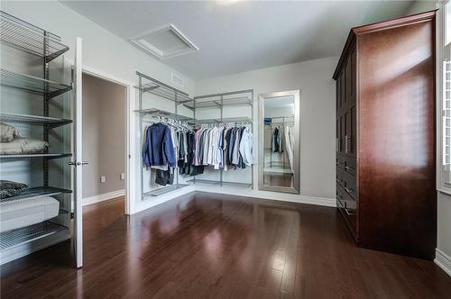 Oversized walk in closet features double built ins and natural light - 4072 Highland Park Drive, Beamsville, ON - Indoor