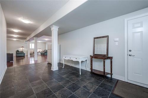 Lower level entry with direct access to garage - 4072 Highland Park Drive, Beamsville, ON - Indoor Photo Showing Other Room