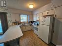 29 Warren Street, Redvers, SK  - Indoor Photo Showing Kitchen With Double Sink 
