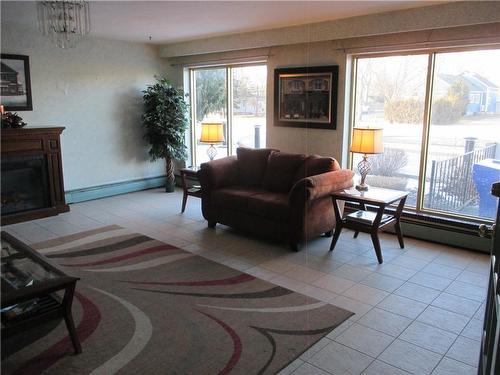 485 Thorold Road|Unit #321, Welland, ON - Indoor Photo Showing Living Room With Fireplace