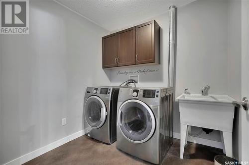 59 Emerald Ridge E, White City, SK - Indoor Photo Showing Laundry Room