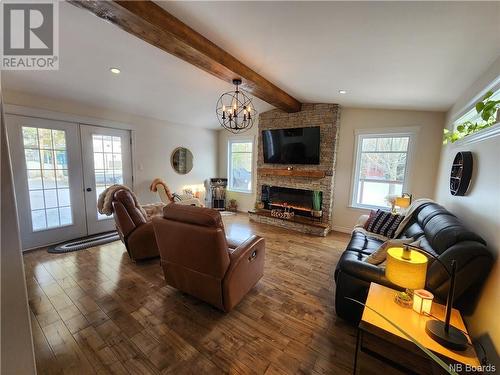 569 St-Jean Street, Saint-Léonard, NB - Indoor Photo Showing Living Room With Fireplace