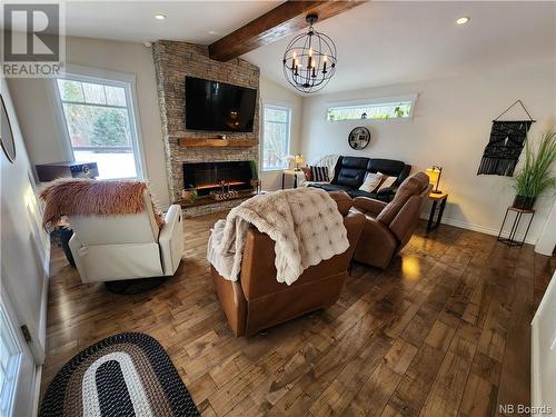 569 St-Jean Street, Saint-Léonard, NB - Indoor Photo Showing Living Room With Fireplace