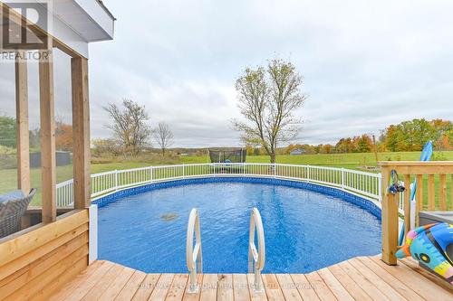 96 Pitts Landing Road, Madoc, ON - Outdoor With Above Ground Pool With Deck Patio Veranda
