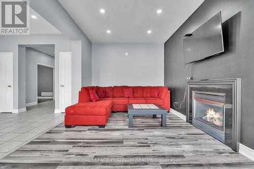 18 Summer Mist Crt, Brampton, ON - Indoor Photo Showing Living Room With Fireplace