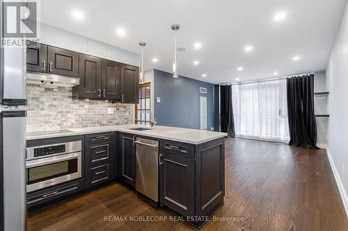 500 - 33 Sheppard Avenue E, Toronto, ON - Indoor Photo Showing Kitchen With Upgraded Kitchen