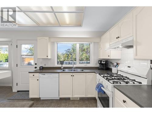 1105 Kelview Street, Kelowna, BC - Indoor Photo Showing Kitchen With Double Sink