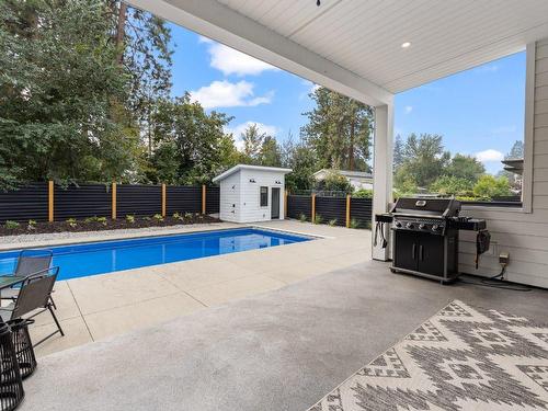 689 Balsam Road, Kelowna, BC - Outdoor With In Ground Pool With Deck Patio Veranda With Exterior