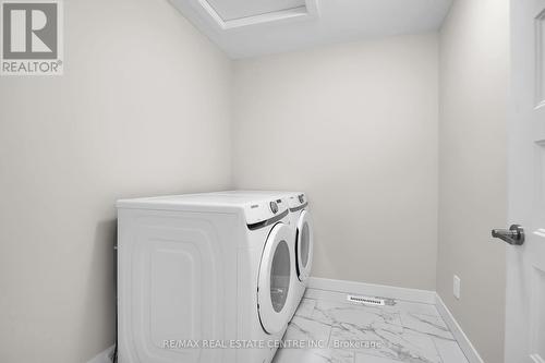 6877 Royal Magnolia Ave E, London, ON - Indoor Photo Showing Laundry Room