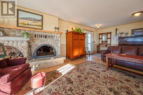 4550 Gulch Road, Naramata, BC - Indoor Photo Showing Living Room With Fireplace