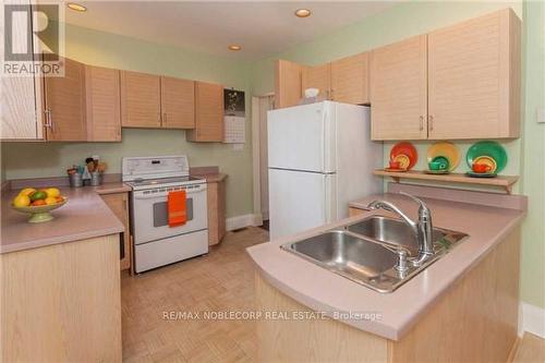 44 Nursewood Road, Toronto, ON - Indoor Photo Showing Kitchen With Double Sink