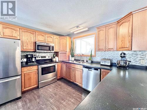 54 Tufts Crescent, Outlook, SK - Indoor Photo Showing Kitchen With Stainless Steel Kitchen With Double Sink