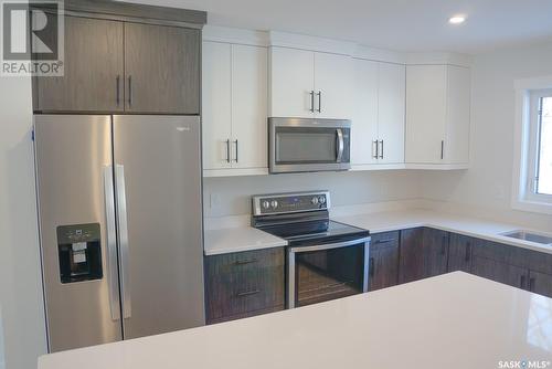 3338 Victoria Avenue, Regina, SK - Indoor Photo Showing Kitchen With Stainless Steel Kitchen