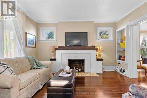 103 Main St E, St. Catharines, ON - Indoor Photo Showing Living Room With Fireplace