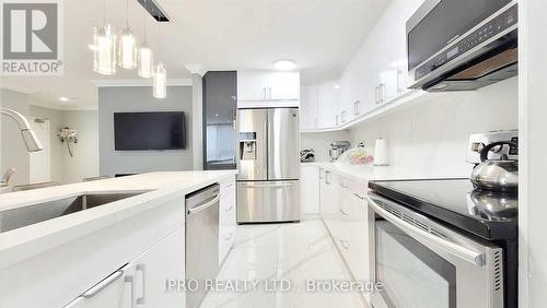 #102 -3170 Kirwin Ave, Mississauga, ON - Indoor Photo Showing Kitchen