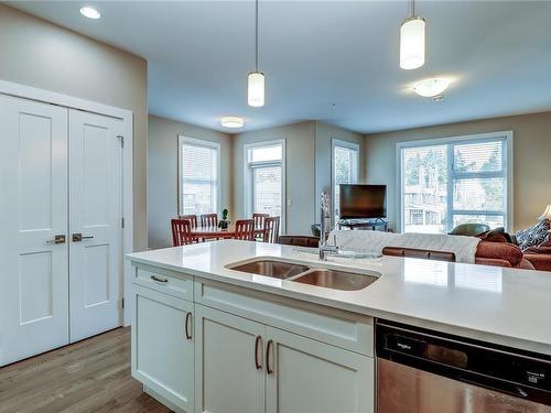 104-1800 Summerhill Pl, Nanaimo, BC - Indoor Photo Showing Kitchen With Double Sink