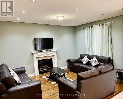 74 Skyvalley Drive, Brampton, ON - Indoor Photo Showing Living Room With Fireplace